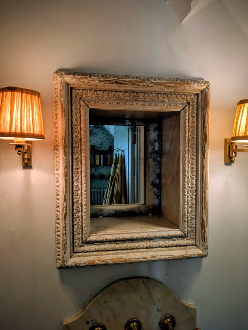 Custom bespoke mirror with handcrafted frame and unique design details