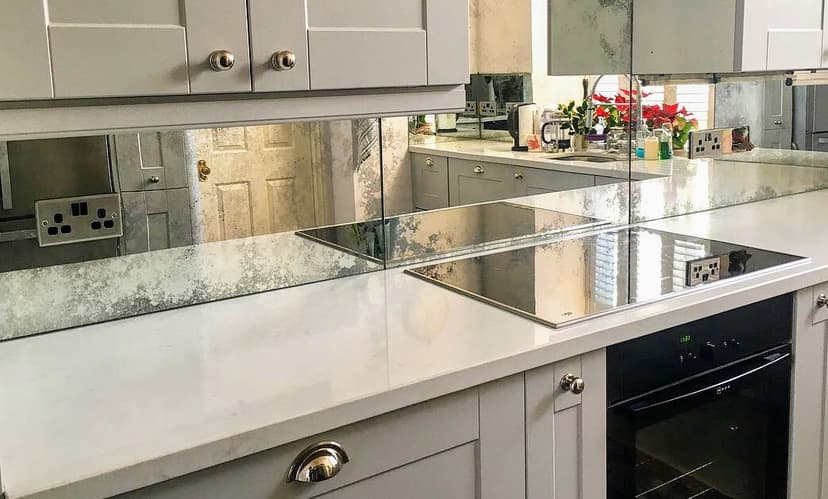 Bespoke glass splashback installation with custom measurements and professional finish