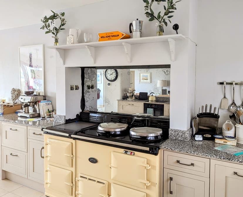 Bespoke glass splashback installation with custom measurements and professional finish