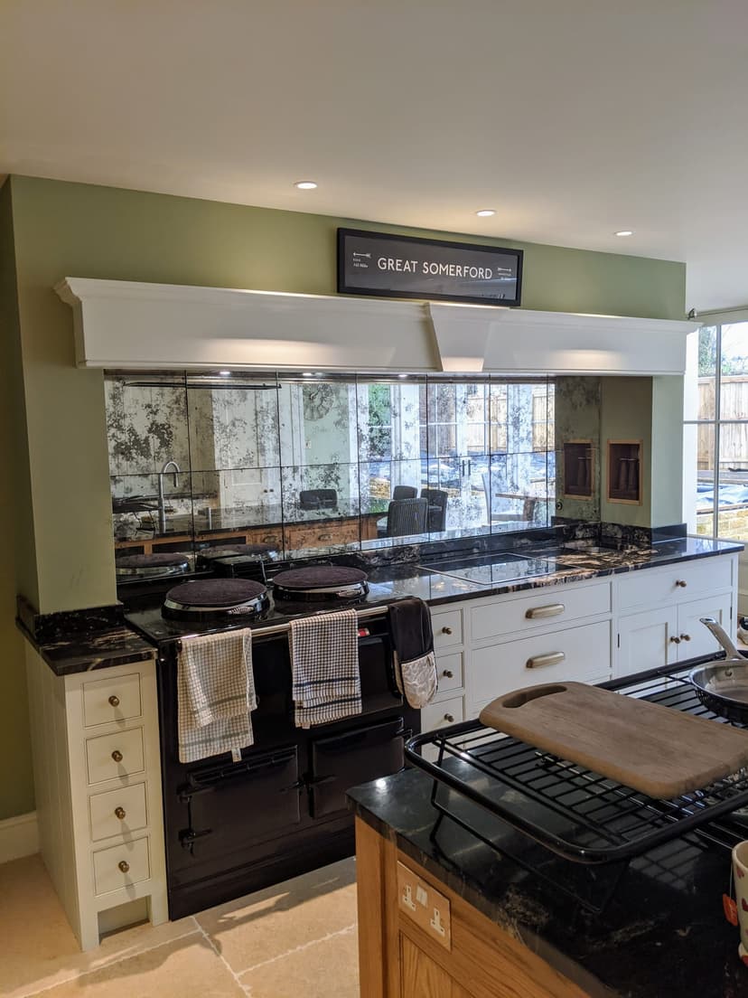 Bespoke glass splashback installation with custom measurements and professional finish